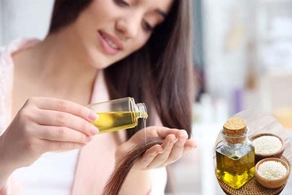 बालों के झड़ने की समस्य से परेशान तिल का तेल लगाये